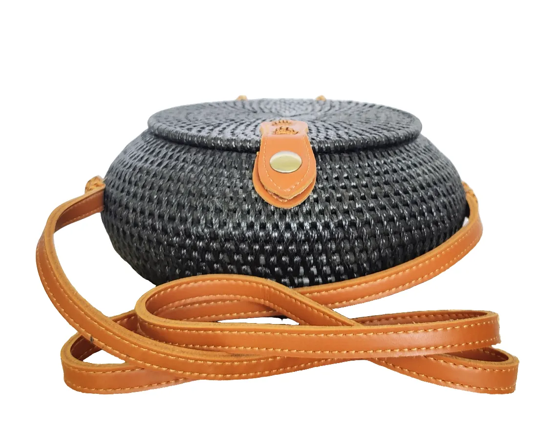 HANDBAG: HANDWOVEN ROUND SLING / CROSSBODY RATTAN BAG.